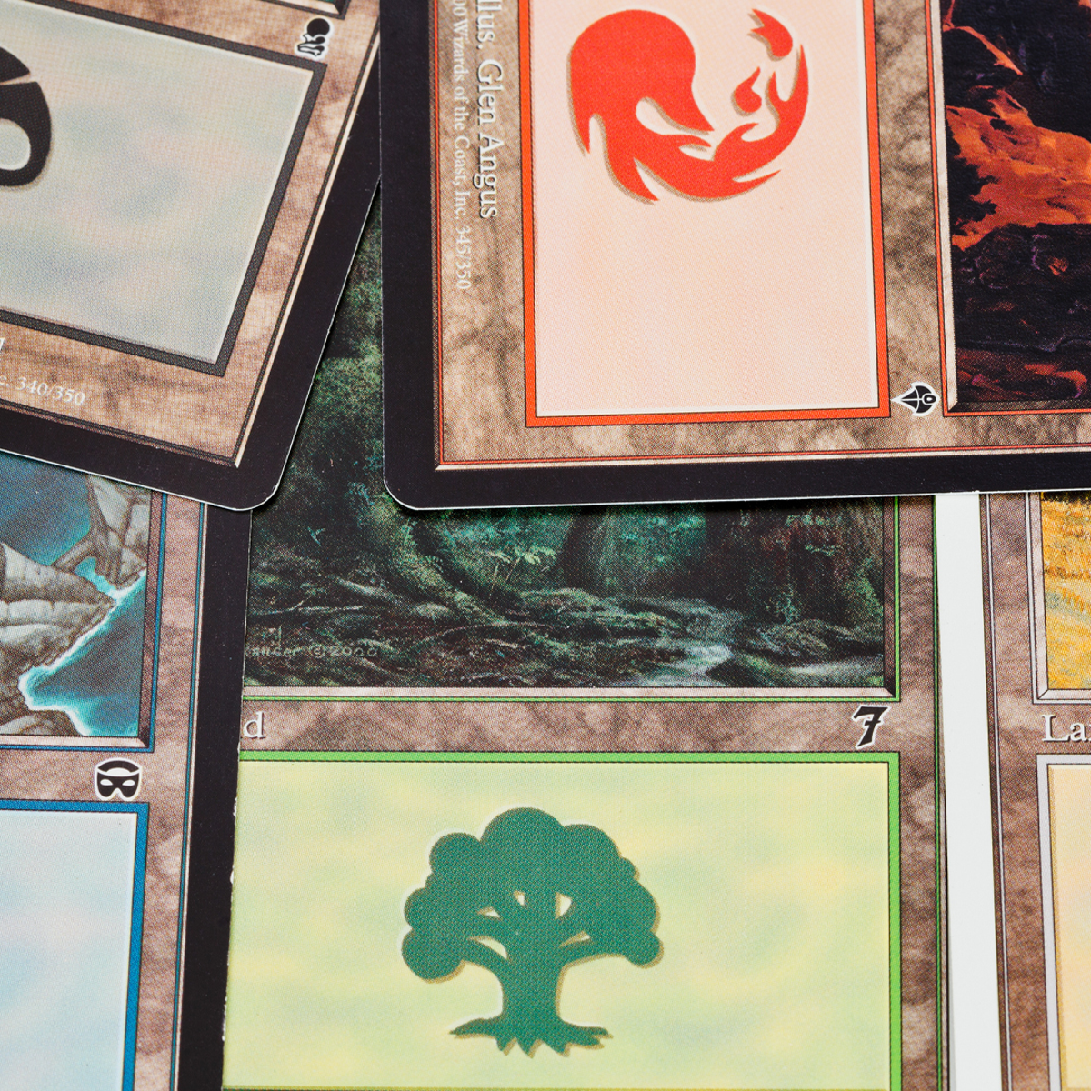 Vibrant collage of Pokémon and Magic: The Gathering cards with NFT icons overlayed, representing trading card NFT giveaways and whitelist drops in the RWA space.